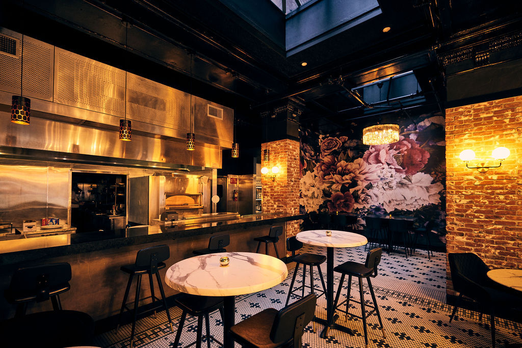 The Harlequin - Bar area with floral mural